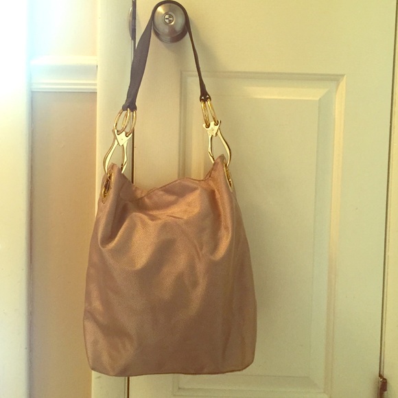 Neutral bucket bag /chunky gold grommet hardware
