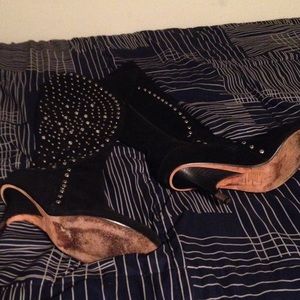 Knee high studded boots