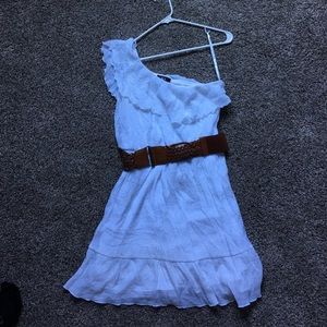 One shoulder white flowing dress