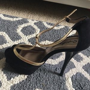 Cupid black and gold peep toe heels.