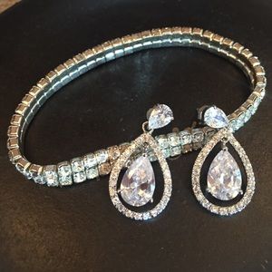 Stretch crystal bracelet with crystal earrings.