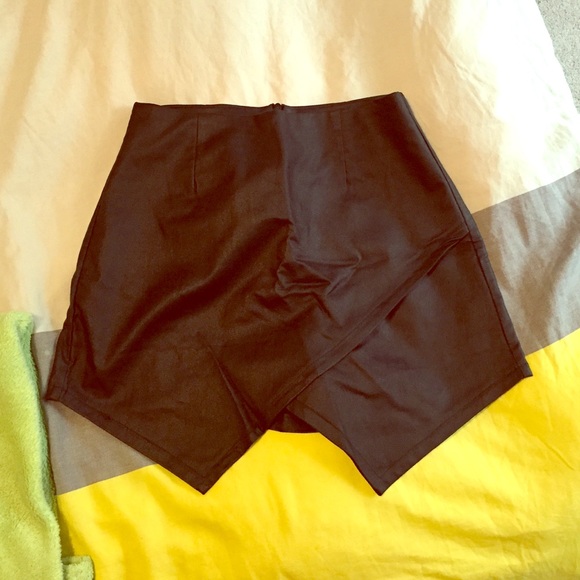 Black shirt with shorts underneath