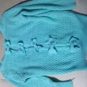 Sweater from Delia's with bow cutouts