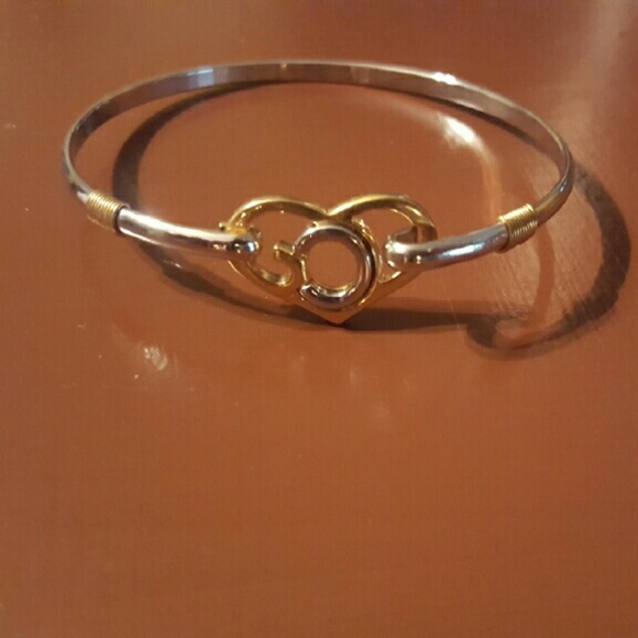 Gold and silver braclete from kays