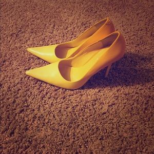 Yellow Aldo pumps