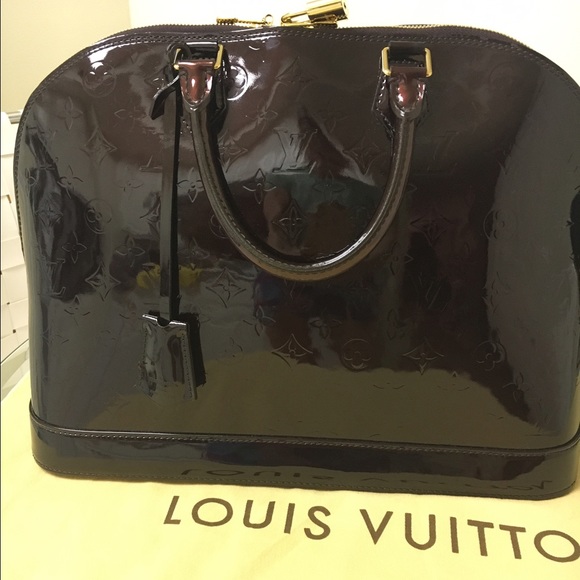 Louis Vuitton alma GM Amarante color.