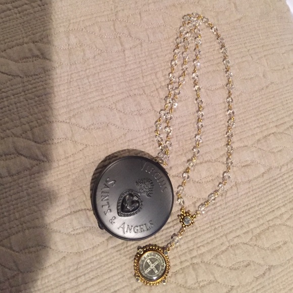 Virgins Saints and Angels Rosary Necklace in gold.