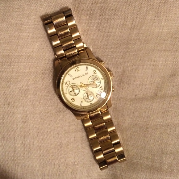 Gold women's Michael Kors watch