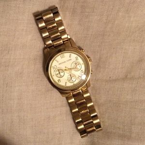 Gold women's Michael Kors watch