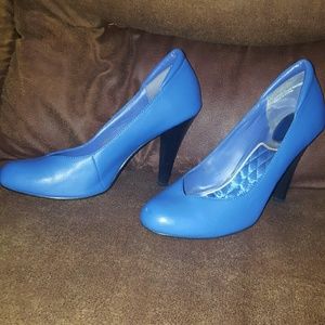 Pumps (color is between purple and dark blue)