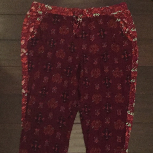 red "tiki" style joggers
