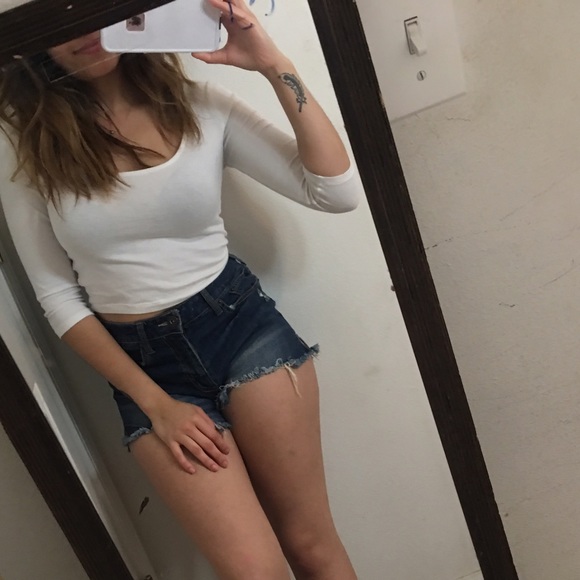 White crop top with open back.