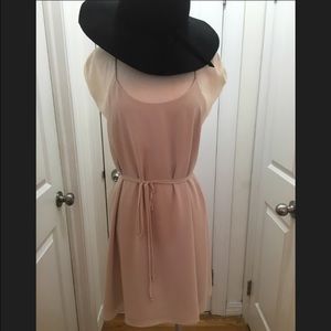 Flowy cream spagetti strap dress.