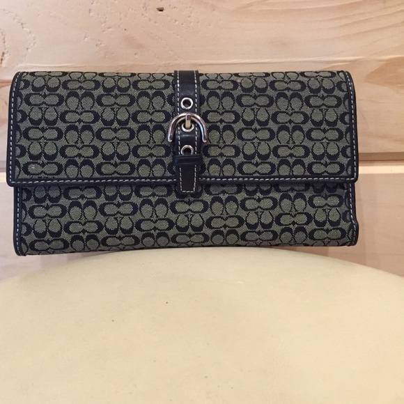 Authentic Coach trifold wallet w/ checkbook.