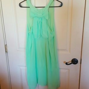 Green bow back dress
