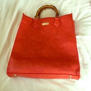 BCBG orange tote with bamboo handles