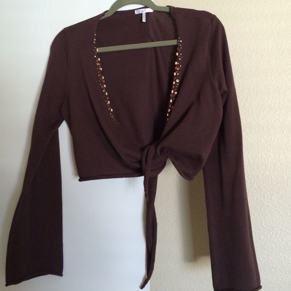 Shrug with beads down the front.