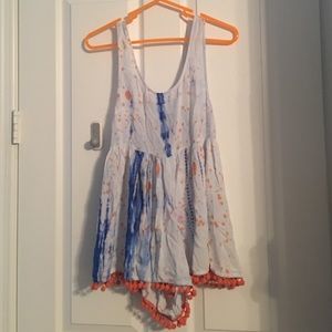 LF romper with Pom Poms on the bottom