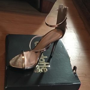 Selling Gold Charlotte Russe heels.