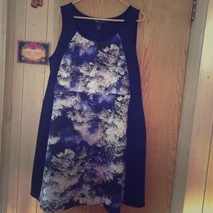 Black dress with purples and white center piece.