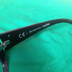 Smith evolve dark pink-purplish sunglasses.