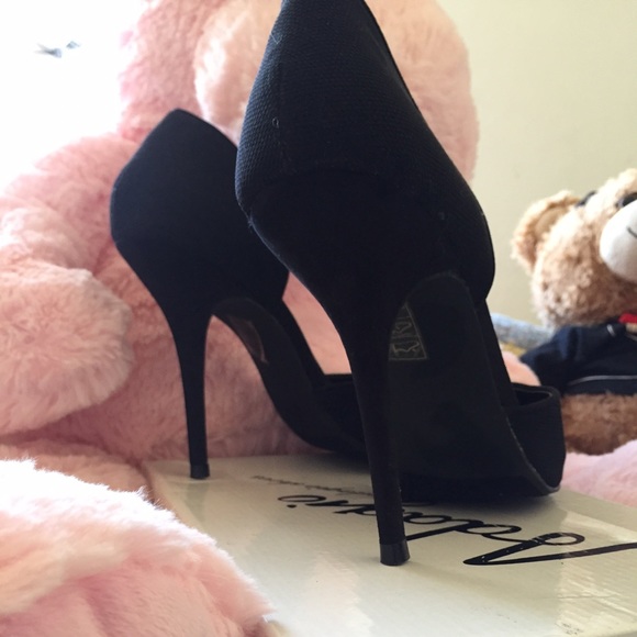 Sexy black shining high heels, wore once.