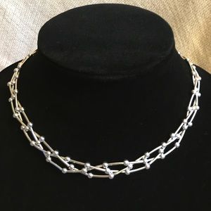 Necklace with braided strand