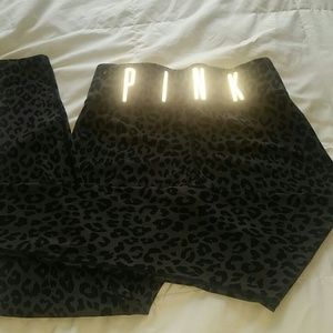 Black and dark grey zebra workout pants.
