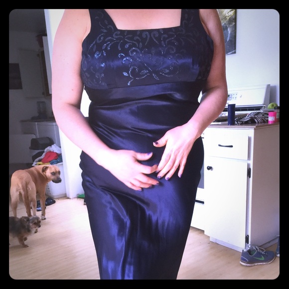 Dark blue prom dress with glittery bust.