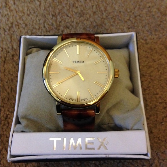 Timex tortoise print patent leather strap watch.