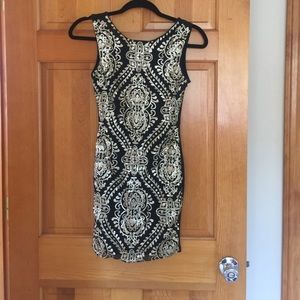 Small gold and black dress.