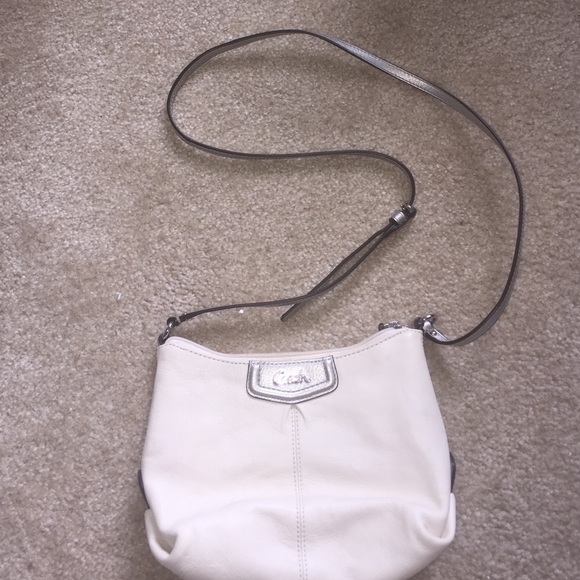 Price firm.  Cream leather coach crossbody.