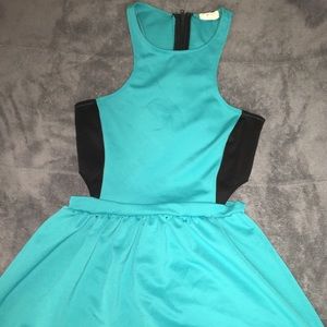 Cute bright blue dress with cut out sides