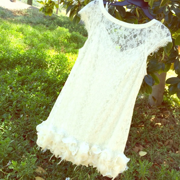Creamy Ruffles and feathers dress