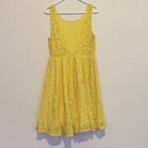 Yellow summer dress with low back
