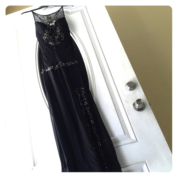 Long beautiful beaded black dress.