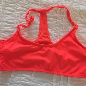 Bright orange/pink swim top, size medium
