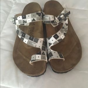 White and black printed Birkenstocks