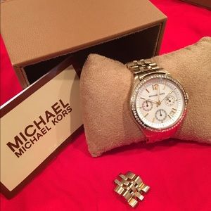 Michael kors gold watch.