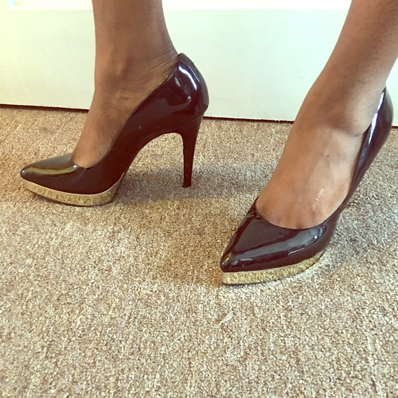 Gold and black platform heels