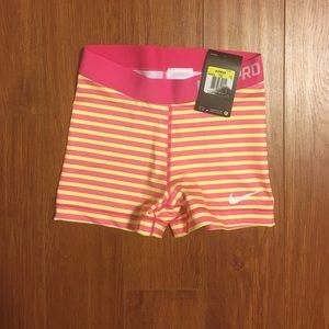 Yellow and Pink Striped Nike Pros