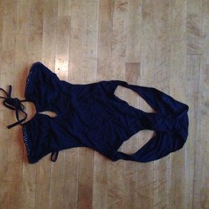 Backless, hip cut outs, sparkly 1 piece.