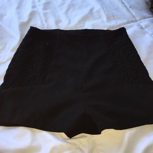 black high waisted shorts with floral detailing
