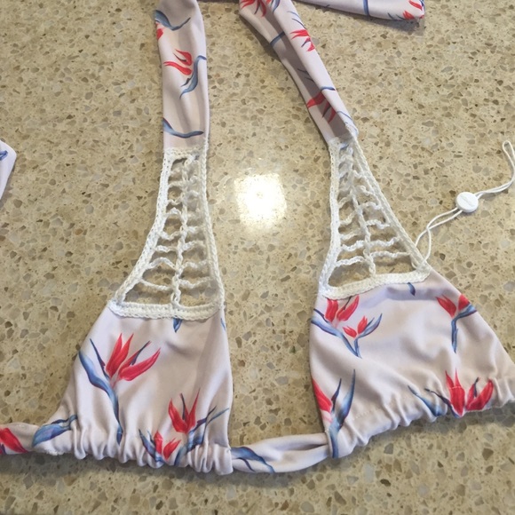 New with part of tag still on suit.  Size xs/p