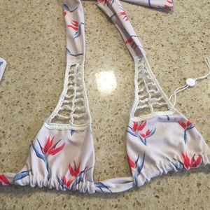 New with part of tag still on suit.  Size xs/p