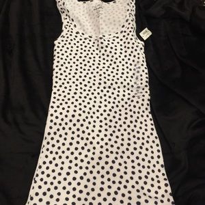 Medium navy blue and white polka dot tank