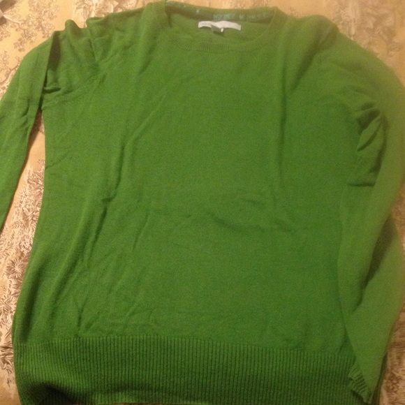 Green long sleeve sweater.