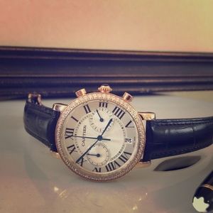 Luxury watch with black leather strap