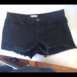 Free people black frayed shorts.