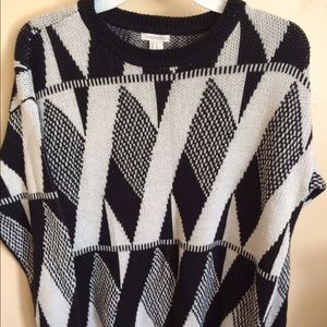 Black and white knitted sweater.